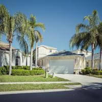 white house with palm trees